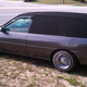 Illustration for article titled For $2,300, this custom Escort lowrider hearse lets you go in style